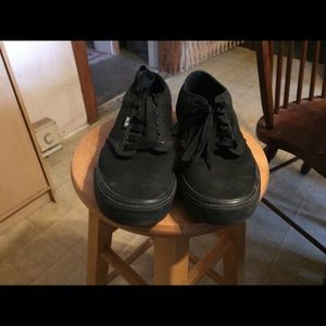 All black vans low skate shoes